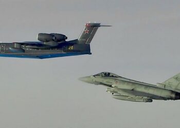 Russian Navy Be-200 shadowed by an Italian Air Force F-2000